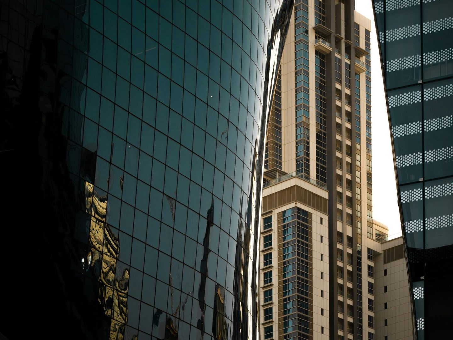 Reflective high-rise towers in a global business district