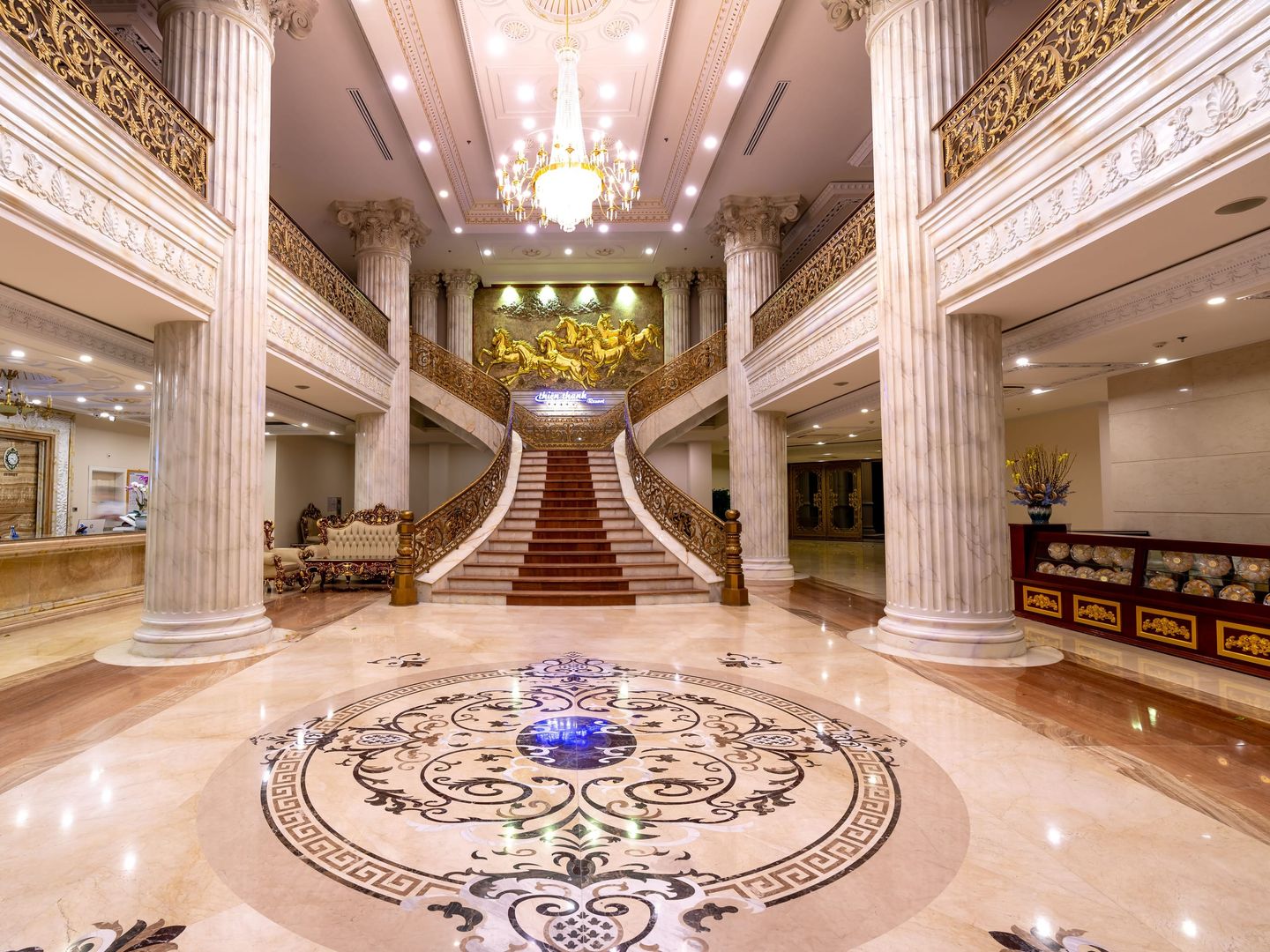 A marble lobby with columns